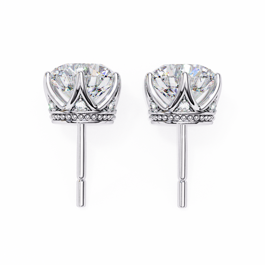 Round brilliant-cut earrings featuring six prongs.