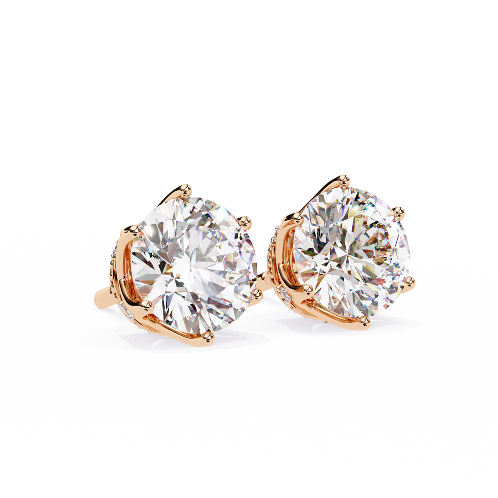 Round brilliant-cut earrings featuring six prongs.