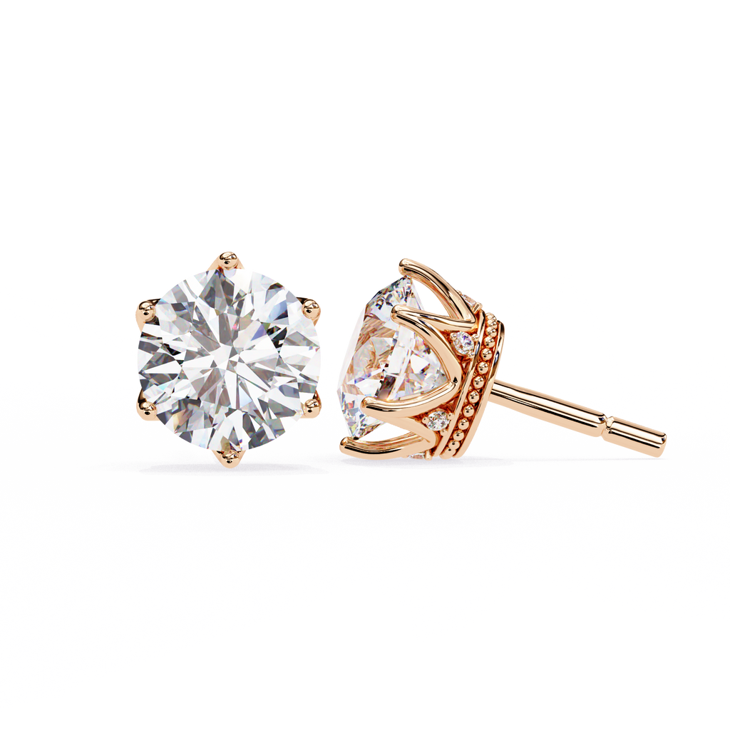 Round brilliant-cut earrings featuring six prongs.